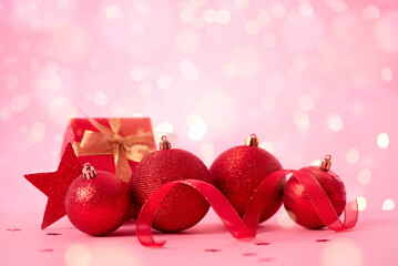Christmas decorations on pink background