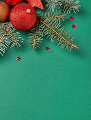 Directly Above Shot Of Christmas Decorations On Green Background
