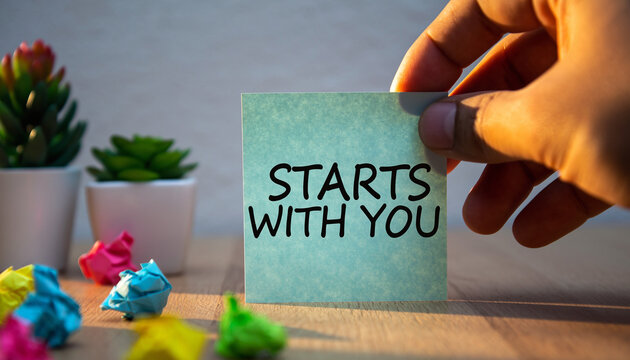 Motivational message about personal growth and taking initiative, featuring hand holding a note with plants and crumpled paper symbolizing ideas