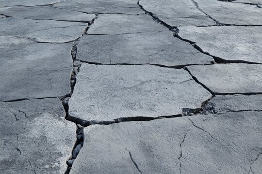 Shattered stone surface with fracture patterns