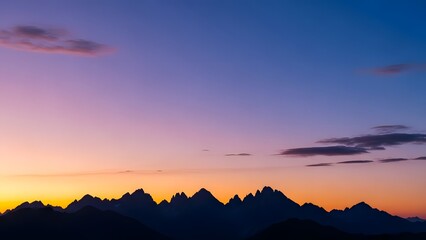 Vibrant Sunset Over Majestic Mountain Silhouettes perfect for website banner, social media post, blog header, desktop wallpaper, print design, presentation