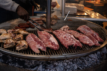 Meat Cooking on a Large Grill