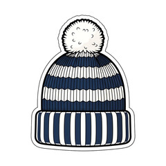 A striped knit winter hat with a fluffy pom pom on top.