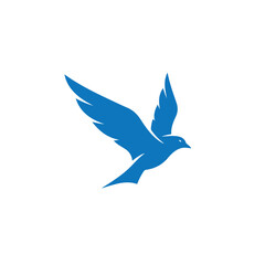 A graceful blue bird in full flight, captured as a striking silhouette with wings outstretched, symbolizing freedom, peace, and natural beauty, isolated on