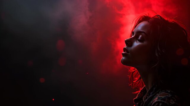 Woman that is looking up at a red light