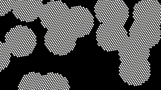 White halftone dots on a black background. Retro comic halftone animation background