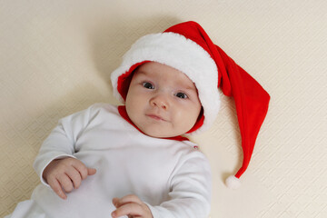 Cute baby in a Santa hat