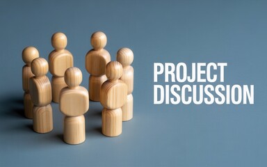 Wooden figures in a group discussing a project