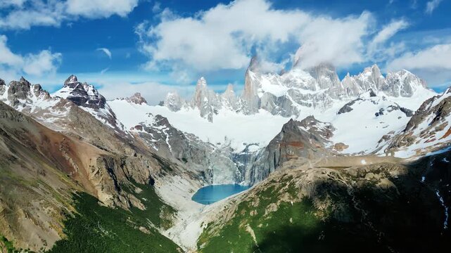 Aerial drone view of the turquoise Laguna de los Tres with Mount Fitz Roy rising behind