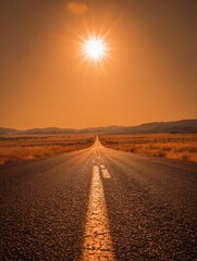 Naklejka premium Majestic Sunset View Over an Endless Road Stretching Through Vast Wilderness