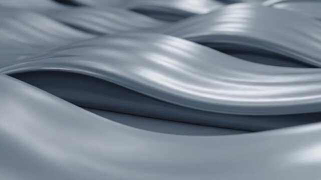 Abstract silver waves background with smooth metallic texture and subtle lighting
