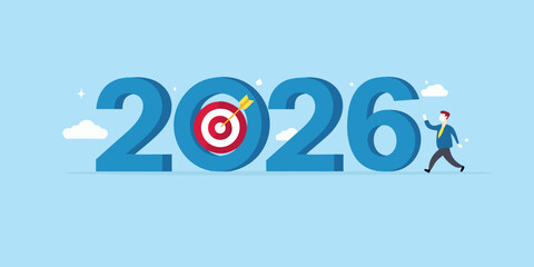 Businessman aiming for success in the year 2026 with a target
