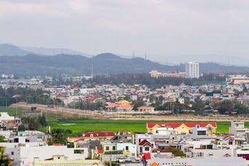 Landscape Of Phu Yen Province In Vietnam With Local Houses And Mountain.