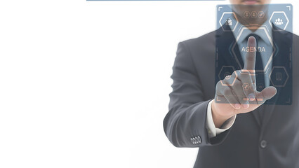Businessman touching digital screen interface displaying business icons and agenda information