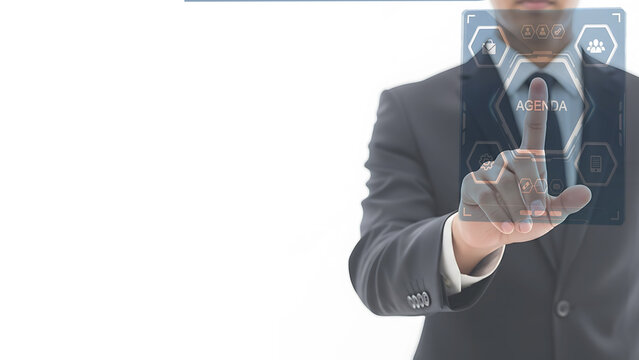 Businessman touching digital screen interface displaying business icons and agenda information