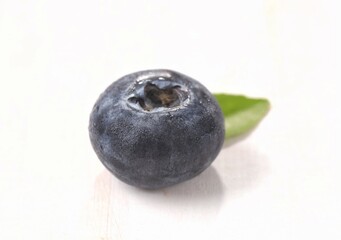 Blueberry are small, round, dark purple fruits that resemble grapes.