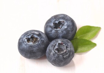 Blueberry are small, round, dark purple fruits that resemble grapes.