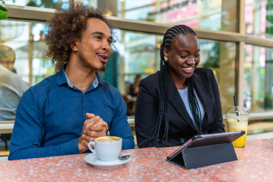 Diverse business professionals sharing ideas during an informal meeting