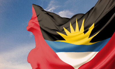 The Antigua and Barbuda flag waving in the blue sky on a flagpole, celebrating Independence Day with the national emblem on flowing fabric.
