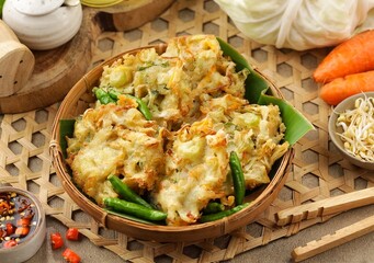 Bakwan Sayur is a fried food made from vegetables and wheat flour which is commonly found in Indonesia © Noor