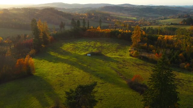 Drone flight over the South Bohemian landscape at the end of October. Colorful harmony of nature in autumn. Czech Republic, Central Europe.