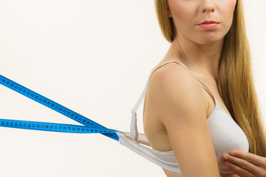 Woman wearing too big bra, loose band