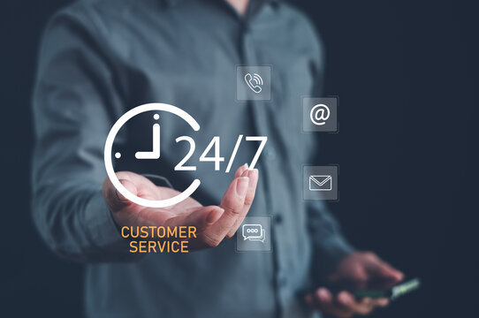 business professional presenting 24-7 customer service icon with phone, email, and chat symbols, highlighting nonstop support, communication, modern service solutions for digital business operations. - Powered by Adobe