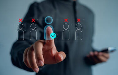 person tapping a digital interface to select the right candidate, symbolizing recruitment, user verification, decision-making, and filtering processes in modern HR and talent management systems.