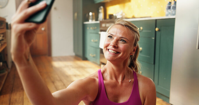 Woman, fitness and selfie with smile, home and app on floor, excited or post on web in morning. Person, exercise and influencer for photography, happy and profile picture on social media at house