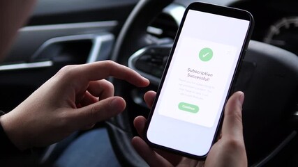 A consumer researches and immediately activates a content subscription service from his car. This complete user journey footage is perfect for demonstrating conversion optimization, mobile payment