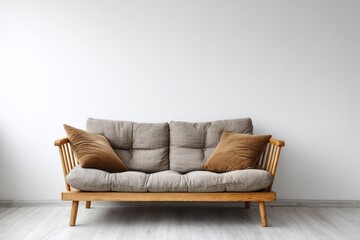 Minimalist wooden frame settee sits against a clean white wall