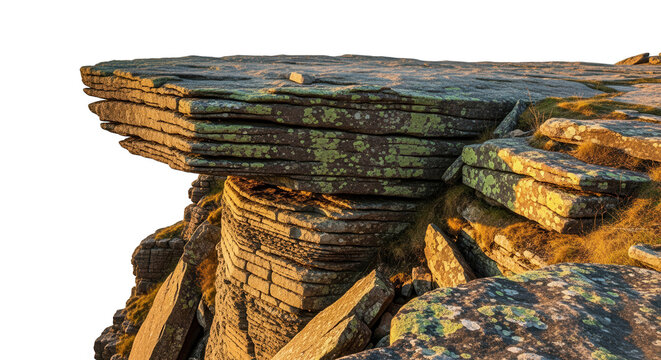 Layered rock cliff edge formation illuminated by warm golden sunlight isolated - Powered by Adobe