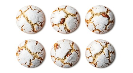 Overhead view of six almond cookies on a white surface