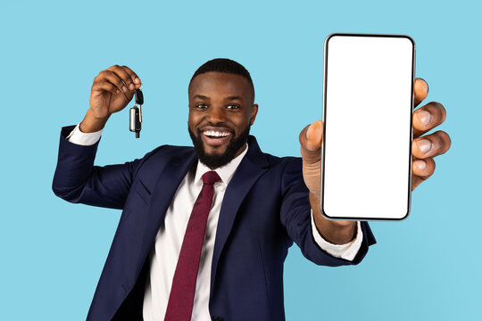 Car Rental. Happy Black Businessman Showing Blank Smartphone And Automobile Key At Camera, Cheerful African American Entrepreneur Recommending New Mobile App Or Website, Collage, Mockup