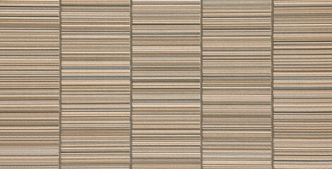 The modern brown concrete tile wall background and texture