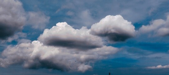 Dramatic Cloudy Sky Over Urban Rooftops Landscape