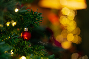 Beautifully illuminated Christmas decoration with sparkling lights, Christmas trees, stars, teddy bears and presents.