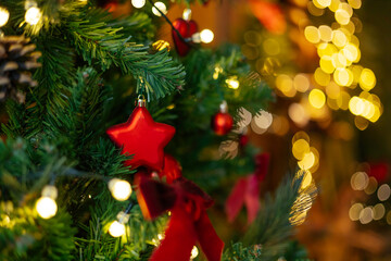 Beautifully illuminated Christmas decoration with sparkling lights, Christmas trees, stars, teddy bears and presents.