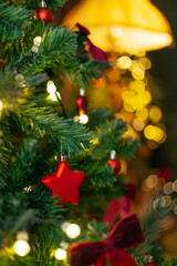 Beautifully illuminated Christmas decoration with sparkling lights, Christmas trees, stars, teddy bears and presents.