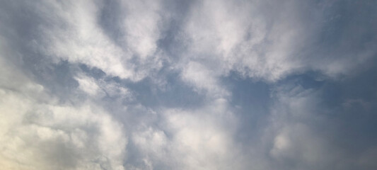 Sky is blue and clear with no clouds. The sky is very bright and the sun is shining. Blue sky with scattered white clouds creating a serene and peaceful atmosphere. Ideal for backgrounds. nature theme