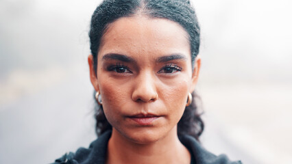 Fototapeta premium Fitness, portrait and serious with woman outdoor for cardio training, dedication or workout. Commitment, exercise and overcast with athlete or runner in nature for activity, health or wellness