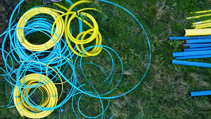 Materials for houses on a new-build housing estate, surrounded by construction equipment