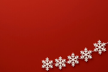 snowflakes on a red background, empty space for text, template, photo background, new year, christmas, 2026, holiday, banner, advertising, layout