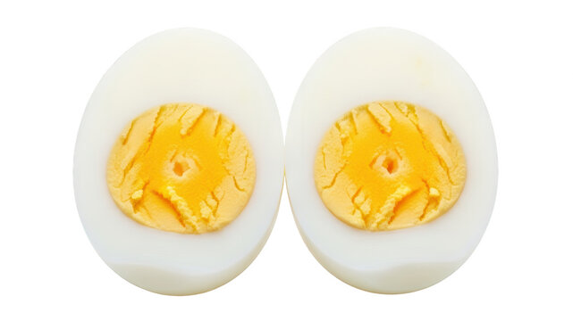 Two halves of a single hard boiled egg displayed side by side against a dark background