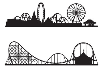  Amusement park skyline with roller coasters and ferris wheel silhouette