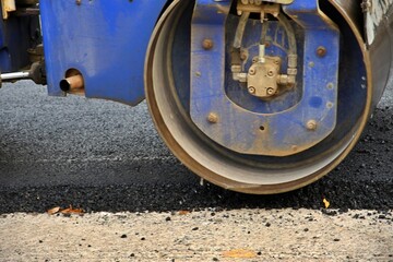 repairing asphalt road, municipal theme