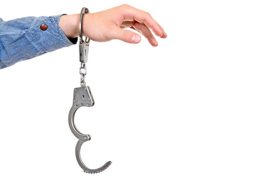 Unlocked Handcuffs on a Hand