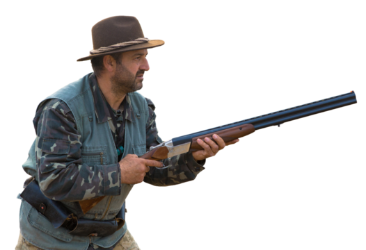 Hunter man in camouflage with a gun during the hunt in search of wild birds or game. Autumn hunting season. - Powered by Adobe