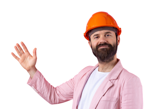 Portrait of young construction engineer wear orange hard hat, in a pink jacket standing on red studio background. The man points with his hand. - Powered by Adobe