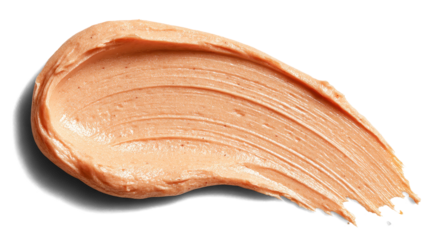 Apricot-tinted sunscreen smear, creamy lotion texture with slight glow isolated on white background. Transparent background